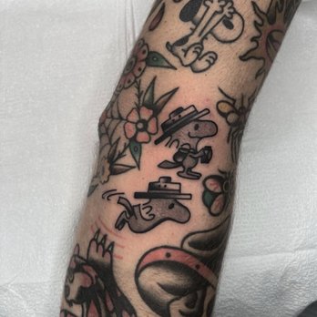 Fantasy's Tattoo - Snoopy and woodstocks from Ari - Tattoo Near Me - Millvale, Pennsylvania Fantasy's Tattoo - Snoopy and woodstocks from Ari - Tattoo Near Me - Millvale, Pennsylvania