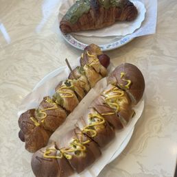 Hot dog bun and green tea croissant