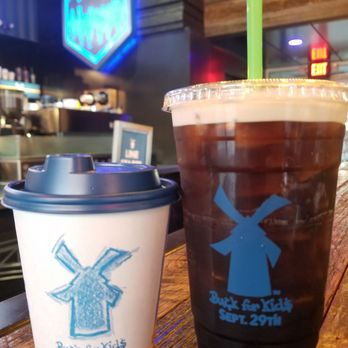 Dutch Bros Coffee - Latte (L), Nitro (R). - Coffee & Tea Near Me - Portland, Oregon Dutch Bros Coffee - Latte (L), Nitro (R). - Coffee & Tea Near Me - Portland, Oregon