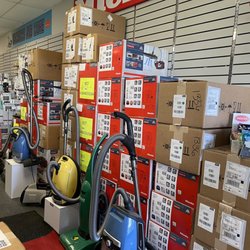 Vacuums and More - Vacuum cleaners almost up to the ceiling