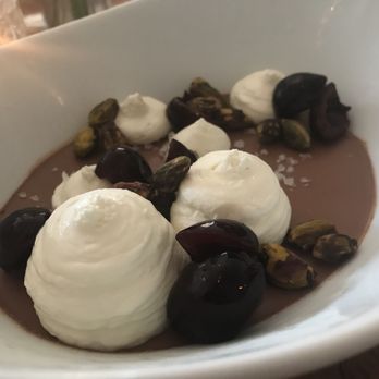 Heirloom - Excellent chocolate panna cotta with goat cheese, black cherries, and pistachios - $10 - New American Near Me - Lewes, Delaware Heirloom - Excellent chocolate panna cotta with goat cheese, black cherries, and pistachios - $10 - New American Near Me - Lewes, Delaware
