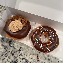 Krispy Kreme - Biscoff Chocolate Iced Cookie Butter Crunch and Chocolate Iced with Sprinkles