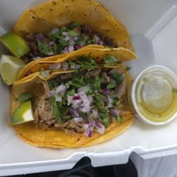 Top carne asada taco. Bottom carnitas taco