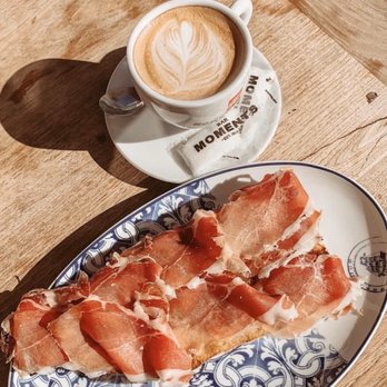 Moments - Tostada- baguette, tomato, jamón ibérico with a delicious cafe con leche. - Seafood Near Me - Urbanova, A Moments - Tostada- baguette, tomato, jamón ibérico with a delicious cafe con leche. - Seafood Near Me - Urbanova, A