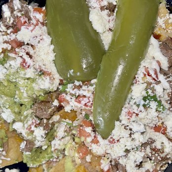 La Ruta Del Taco - Steak nachos with extra cheese - Tacos Near Me - Queens, New York La Ruta Del Taco - Steak nachos with extra cheese - Tacos Near Me - Queens, New York
