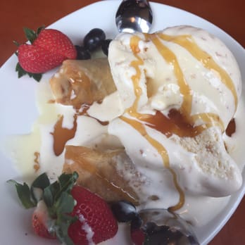 P.F. Chang's - Fried Banana Wonton with a Pineapple Coconut ice cream drizzled with caramel.. By far, 1 of the best desserts ever ! - Chinese Near Me - Miami, Florida P.F. Chang's - Fried Banana Wonton with a Pineapple Coconut ice cream drizzled with caramel.. By far, 1 of the best desserts ever ! - Chinese Near Me - Miami, Florida