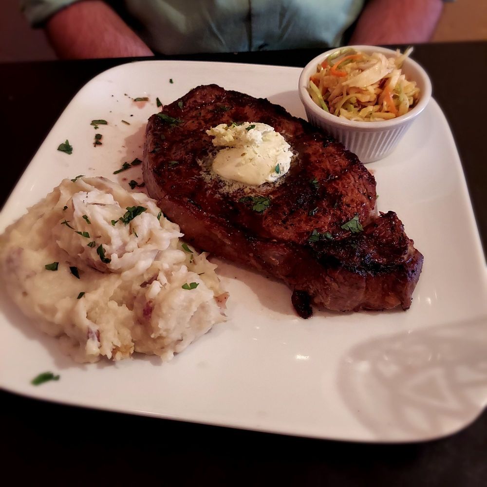 Aged Angus, garlic mashed, and honey lime slaw Aged Angus, garlic mashed, and honey lime slaw