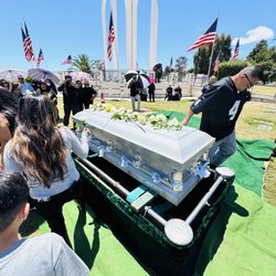 Greenwood Memorial Park & Mortuary - Beautiful backdrop of white arches and American flags!