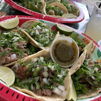 La Patrona - Carnitas (pork) tacos with onion, cilantro, lime and salsa verde. Margarita with fresh lime juice -- not a mix -- partially consumed. - Mexican Near Me - New Orleans, Louisiana La Patrona - Carnitas (pork) tacos with onion, cilantro, lime and salsa verde. Margarita with fresh lime juice -- not a mix -- partially consumed. - Mexican Near Me - New Orleans, Louisiana