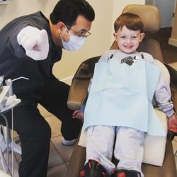 Beacon Hill Dental - Beacon Hill's Hygienist Miguel with one of our younger patients.