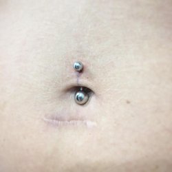 Purple Dot Piercings and Gifts - Belly button piercing