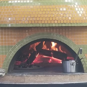 Grata’s Pizzeria - My pizza cooking away! Took 5 minutes! - Pizza Near Me - Austin, Texas