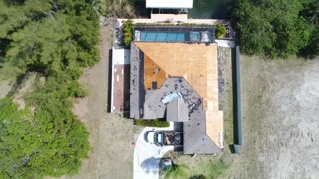 Slide of Umbrella Roofing And Repairs