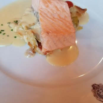 La Petite Chaise - Salmon with butter sauce and potatoes. - French Near Me - Paris, 75 La Petite Chaise - Salmon with butter sauce and potatoes. - French Near Me - Paris, 75