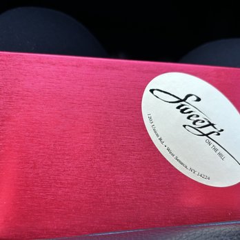 Sweets On the Hill - a pink box with a sticker on it - Chocolatiers & Shops Near Me - West Seneca, New York Sweets On the Hill - a pink box with a sticker on it - Chocolatiers & Shops Near Me - West Seneca, New York