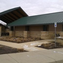 large shelter with restrooms near the park entrance large shelter with restrooms near the park entrance