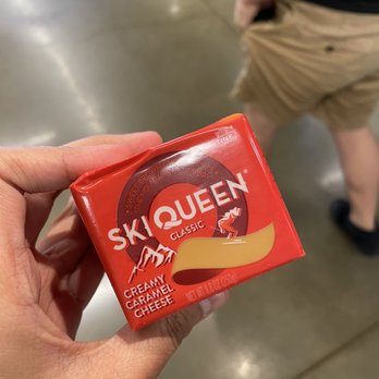 Premier Gourmet - a hand holding a packet of skiqueen - Beer, Wine & Spirits Near Me - Amherst, New York Premier Gourmet - a hand holding a packet of skiqueen - Beer, Wine & Spirits Near Me - Amherst, New York