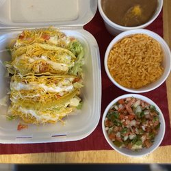 Taqueria Alma - Hard shell tacos with large rice, large beans and pico de gallo.