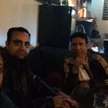 Kayan Shisha Cafe - a group of men sitting at a table - Hookah Bars Near Me - Burnaby, British Columbia Kayan Shisha Cafe - a group of men sitting at a table - Hookah Bars Near Me - Burnaby, British Columbia