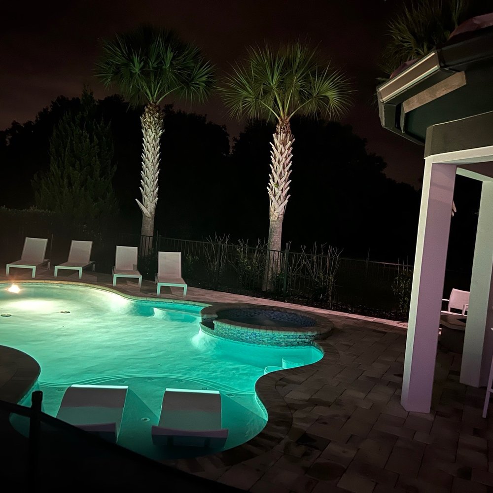Top Villas - Pool at night with pool lights - Vacation Rentals Near Me - Davenport, Florida Top Villas - Pool at night with pool lights - Vacation Rentals Near Me - Davenport, Florida