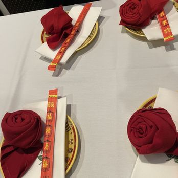 Zouji Dumpling House - Pretty settings with napkins rolled up like roses - Dim Sum Near Me - Glen Cove, New York Zouji Dumpling House - Pretty settings with napkins rolled up like roses - Dim Sum Near Me - Glen Cove, New York