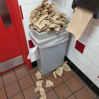 Firehouse Subs - Unattended bathroom  trash over flow. - Sandwiches Near Me - Austin, Texas