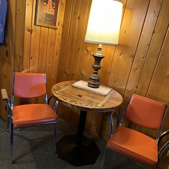 Caboose Motel & Gift Shop - Little table and chairs perfect for the morning coffee or evening cocktails - Hotels Near Me - Durango, Colorado Caboose Motel & Gift Shop - Little table and chairs perfect for the morning coffee or evening cocktails - Hotels Near Me - Durango, Colorado