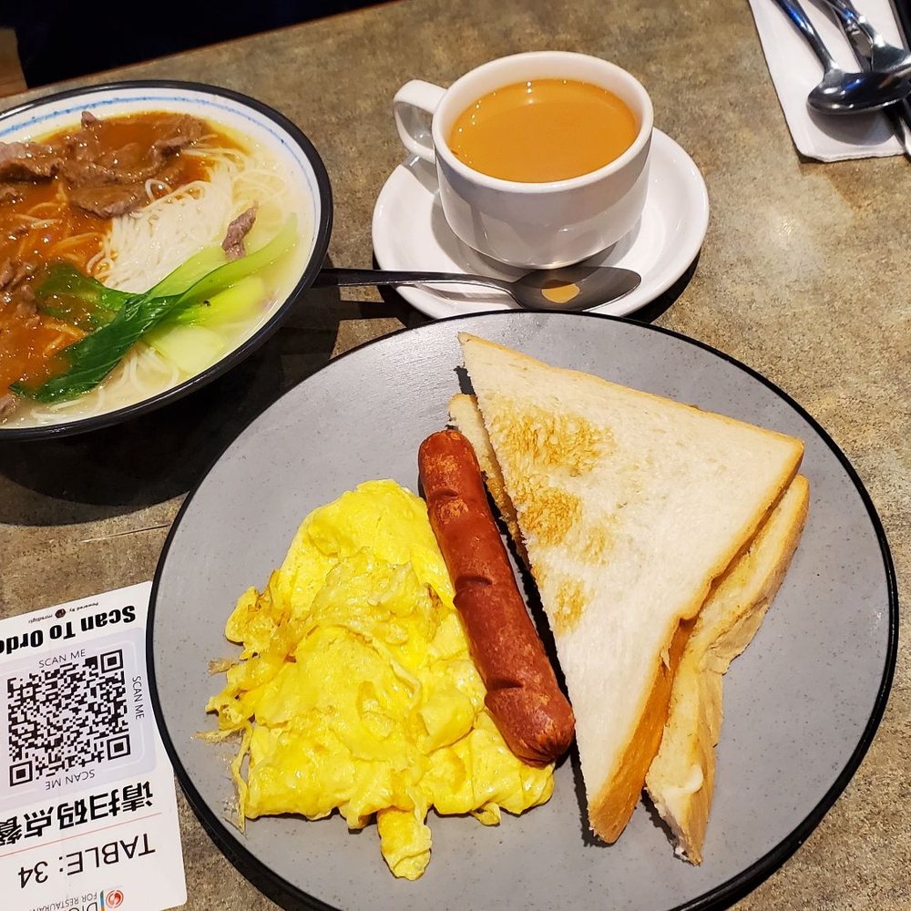 Satay beef vermicelli, egg, sausage and toast combo
