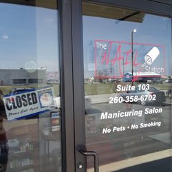 The Nail Station - Front door. No hours listed.