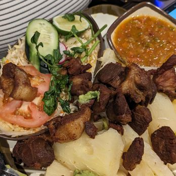 Sonsonate Grill - Yucca (regular) with fried pork. Large dish for an appetizer, $11.50 - Salvadoran Near Me - South Gate, California Sonsonate Grill - Yucca (regular) with fried pork. Large dish for an appetizer, $11.50 - Salvadoran Near Me - South Gate, California
