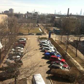 Humboldt Park Health - View of the east parking lot with the Downtown Chicago skyline in the distance. - Hospitals Near Me - Chicago, Illinois