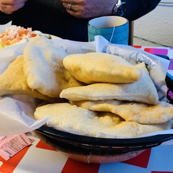 Montano's Restaurant - These are the sopapillas, you drizzle some honey over it! They taste homemade! Super delicious! - Mexican Near Me - Belen, New Mexico