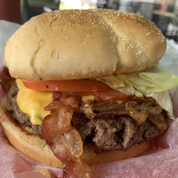 The Hideaway Bar - The Hideaway Special Burger. Very simple with great flavor. This thing is big. - Dive Bars Near Me - Orlando, Florida