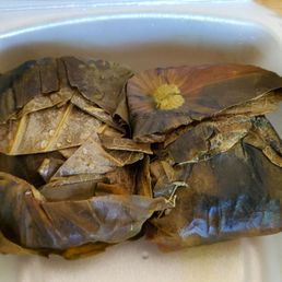 Sticky Rice Wrapped in Lotus Leaf: Stuffed with pork and mushrooms ($7) Sticky Rice Wrapped in Lotus Leaf: Stuffed with pork and mushrooms ($7)