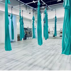 Aerial Yoga studio offering AIReal Yoga classes for all levels.