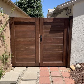 SFV Wood Builds - Newly built fence to hide our trash cans and add some security. This is what the fence looked like after staining. - Handyman Near Me SFV Wood Builds - Newly built fence to hide our trash cans and add some security. This is what the fence looked like after staining. - Handyman Near Me