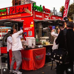 Fresh Pizza on Wheels - Tossing Dough