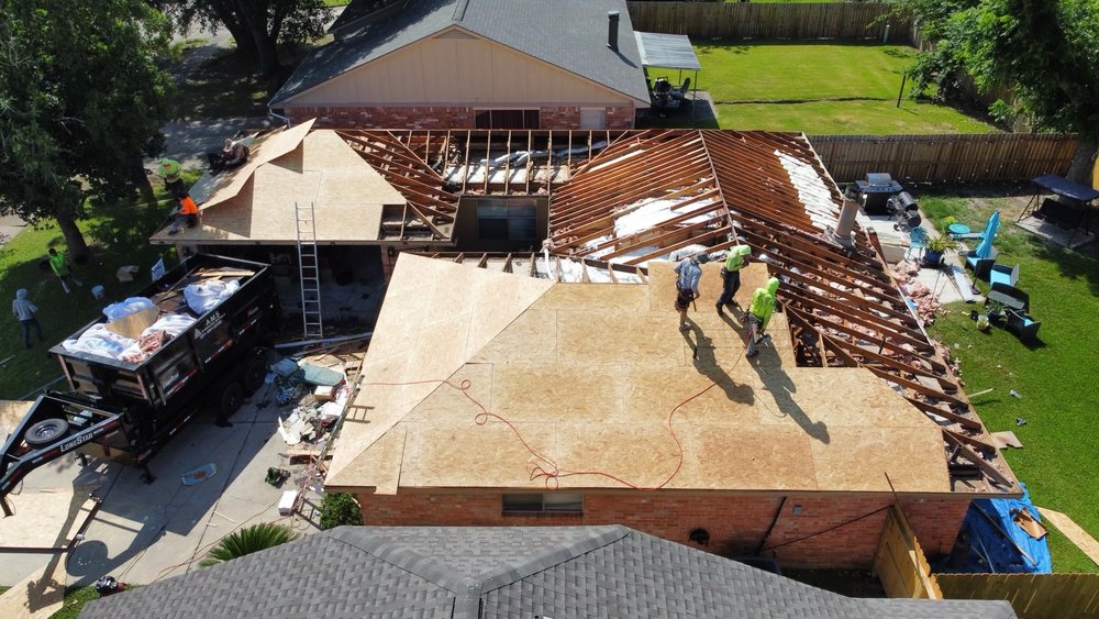 Slide of Space City Roofing & Remodeling