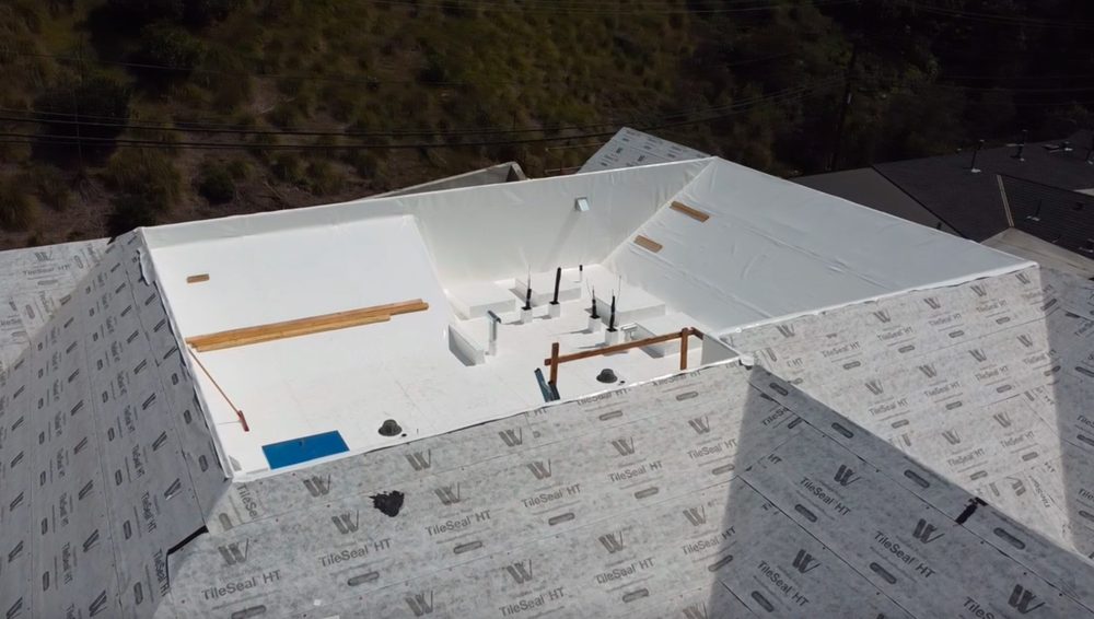 Slide of Honey Badger Roofing