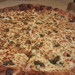 Extra large with mushrooms, spinach, and tomatoes. Soggy, but overall okay tasting. Extra large with mushrooms, spinach, and tomatoes. Soggy, but overall okay tasting.