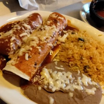 El Toro Mexican Grill and Bar - Specialty combo -one chicken enchilada and one chicken burrito with rice and beams - Mexican Near Me - Amherst, New York El Toro Mexican Grill and Bar - Specialty combo -one chicken enchilada and one chicken burrito with rice and beams - Mexican Near Me - Amherst, New York