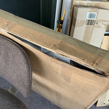 Box & Ship - Two pieces of packing tape used to barely close one end of box - Shipping Centers Near Me - Pasadena, California