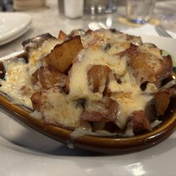 Bill’s Place - Cajun ghost pepper cheese steak tip potato app