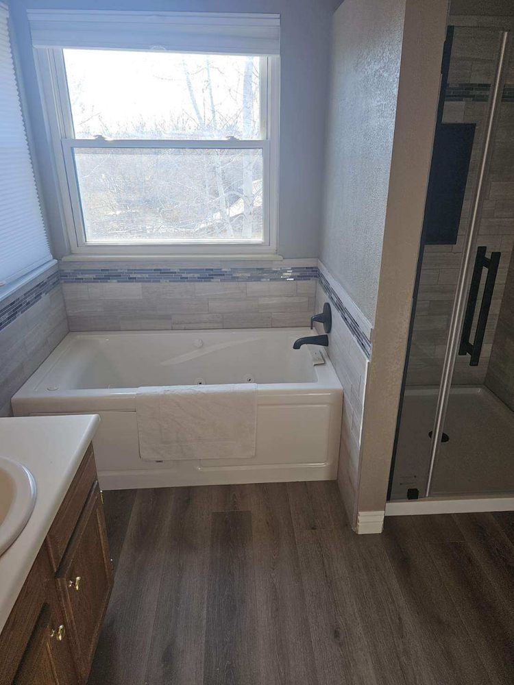 Slide of MKV Custom Remodels