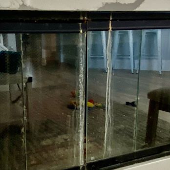 BeachBox Vacation Rentals - Fireplace glass with something funky running down the glass - Vacation Rentals Near Me - Galveston, Texas