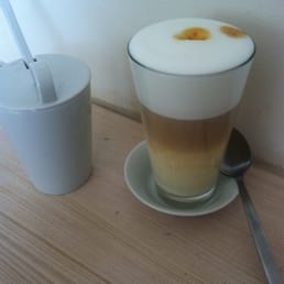 Caffe latte and raw sugar
