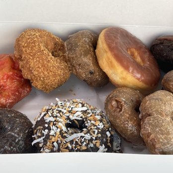 Ruby Donut - First visit loot: chocolate, chocolate coconut, 4 blueberry, chocolate-iced chocolate, chocolate-iced glazed, apple cider, raspberry fritter - Donuts Near Me - Ayer, Massachusetts