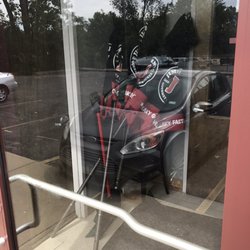 Jimmy John's - Sadly, the umbrellas are behind this locked door and not in use at the outside tables. Not sure why...