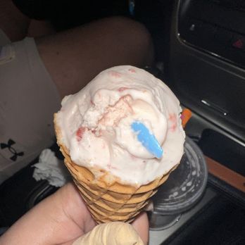 Dunkin' -  a hand holding a cone of ice cream - Coffee & Tea Near Me - Chicago Heights, Illinois