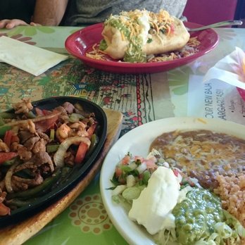 El Chipotle Taqueria - Triple fajita plate(front) , chimichanga(back) - Mexican Near Me - Soquel, California El Chipotle Taqueria - Triple fajita plate(front) , chimichanga(back) - Mexican Near Me - Soquel, California